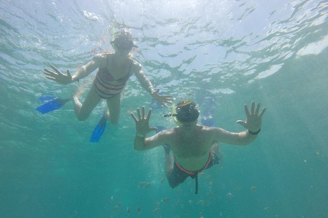 Private Catamaran Tour to Isla Mujeres with Snorkeling from Cancun - Calle Hidalgo and central Isla Mujeres