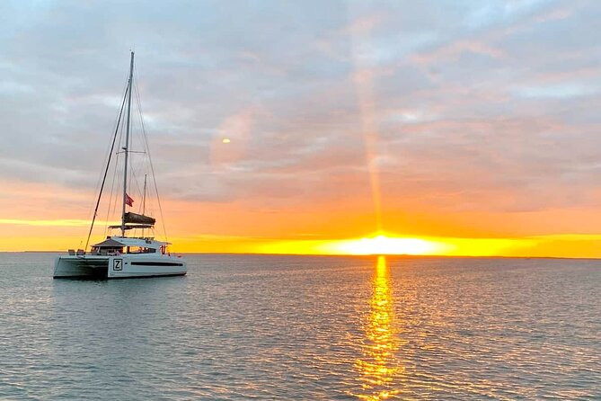 Private Exclusive Sundowner catamaran with Dinner & Transfer - Returning after dark