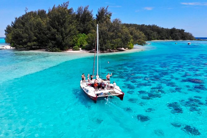 PRIVATE Full Day Tour : Moorea Snorkeling & Sailing on a Catamaran named Taboo - Snorkeling among coral, rays, and underwater tikis