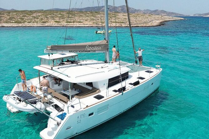 Private Half Day Catamaran Cruise - Sailing toward secluded Cycladic coves