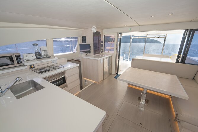 Private Half-Day Luxury Catamaran Experience - Swimming and snorkeling along the coast