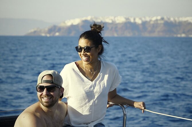 Private Luxury Santorini Catamaran Cruise with Port Pickup - A Greek meal near Nea or Palea Kameni