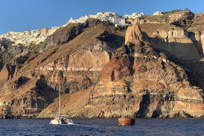 Private Luxury Santorini Catamaran Cruise with Port Pickup - Daytime sailing or a sunset finish