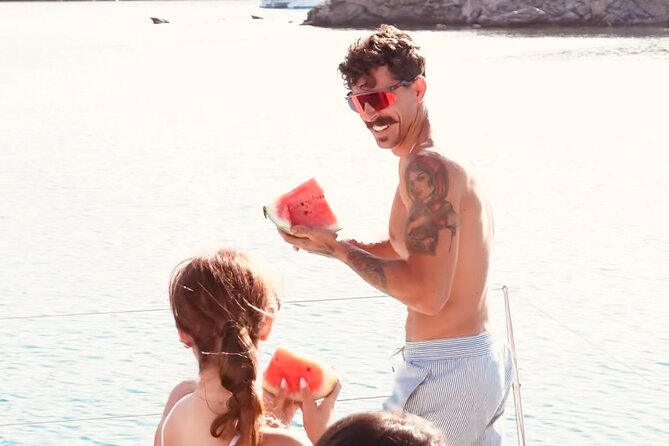 Private Mykonos Catamaran Day Cruise with Meals & Water Toys - Leaving Ornos for the Aegean