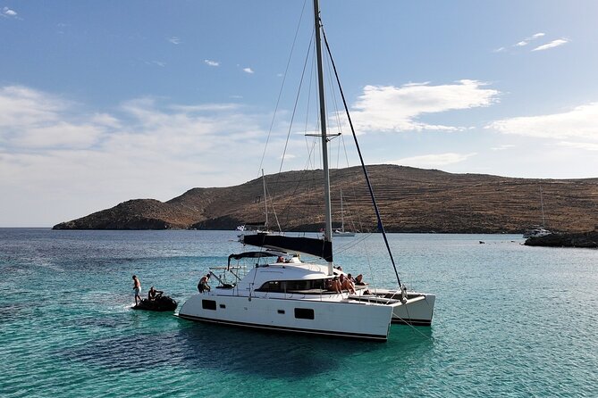 Private Mykonos Catamaran Day Cruise with Meals & Water Toys - Stop two: Delos for scenery and ancient sites