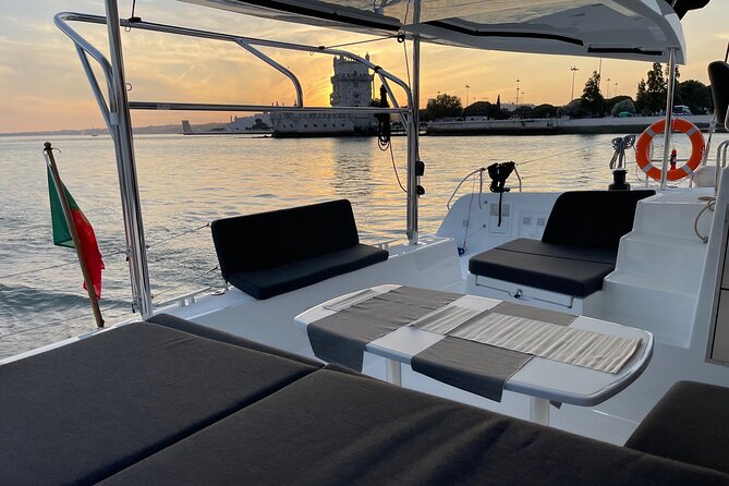 Private tour on a LUXURY Catamaran (Sunset and Wine Tour) - Passing beneath Lisbon’s famous suspension bridge