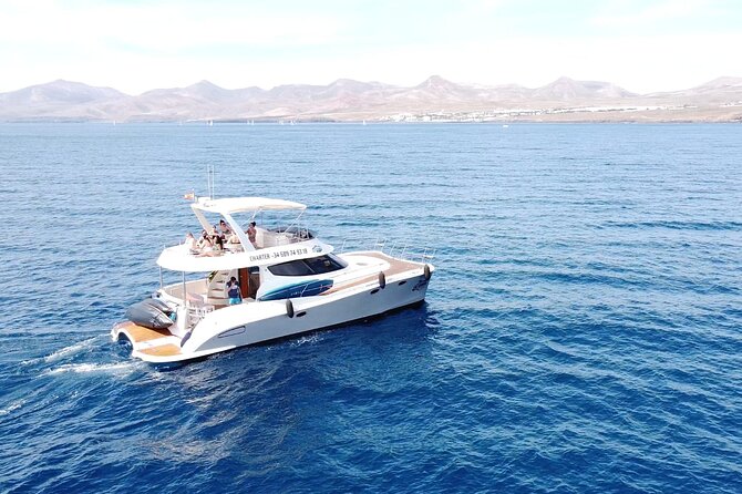Puerto del Carmen: Catamaran Trip with Water Sports - A four-hour escape from Puerto Calero