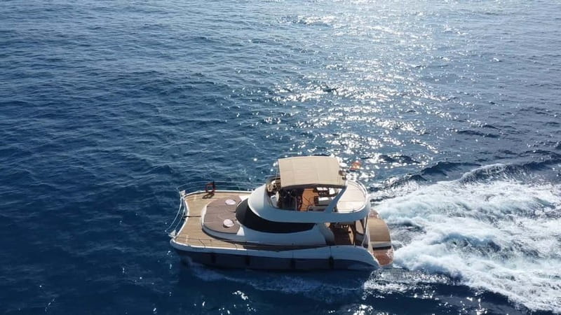 Puerto del Carmen: Private Sunset Catamaran Tour with Drinks - Swimming, fish, and the wakeboarding option