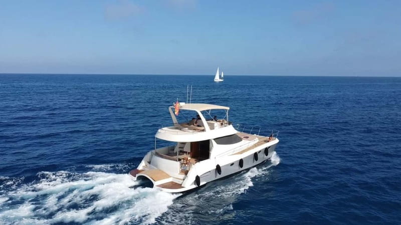 Puerto del Carmen: Private Sunset Catamaran Tour with Drinks - Transfers, clothing, and practical details