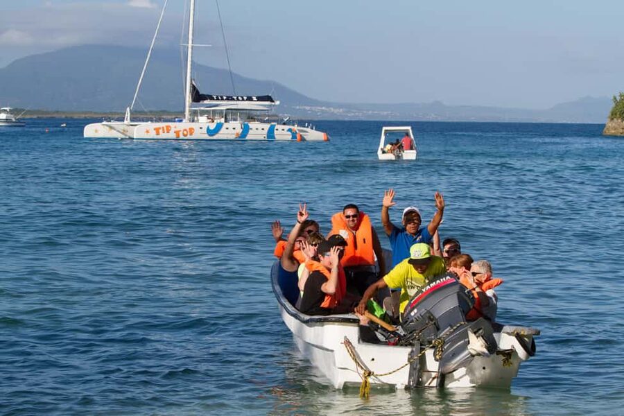 Puerto Plata: Sosúa Catamaran Day Trip with Lunch and Drinks - What the crew adds to the day