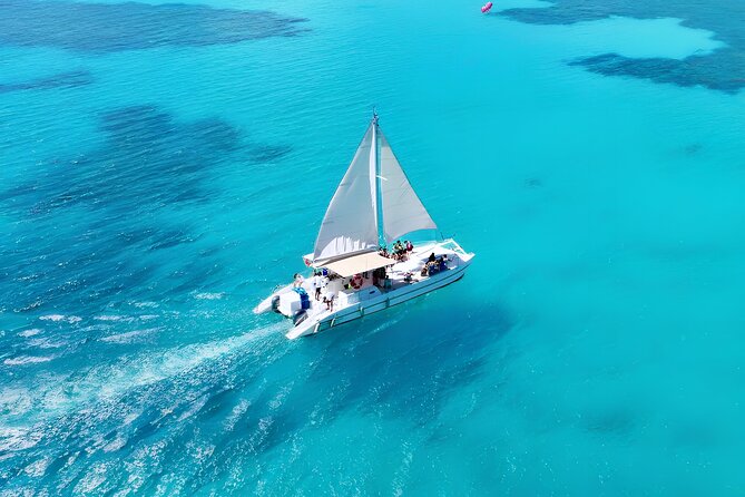 Punta Cana Catamaran Party– Snorkeling, Open Bar, Music & Pickup - A Caribbean party boat, not a quiet catamaran cruise