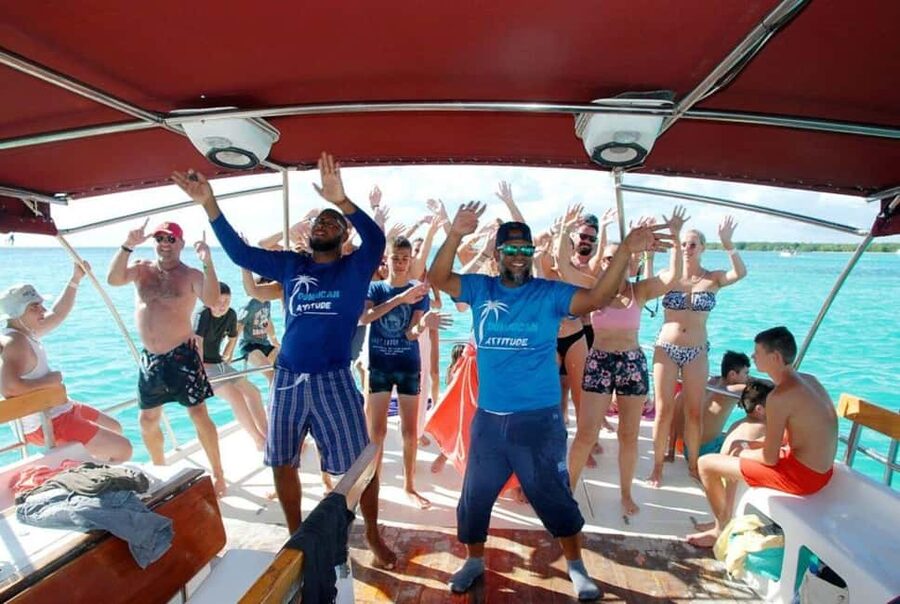 Punta Cana - Santo Domingo: Saona Island VIP Catamaran Tour - The catamaran ride home turns festive