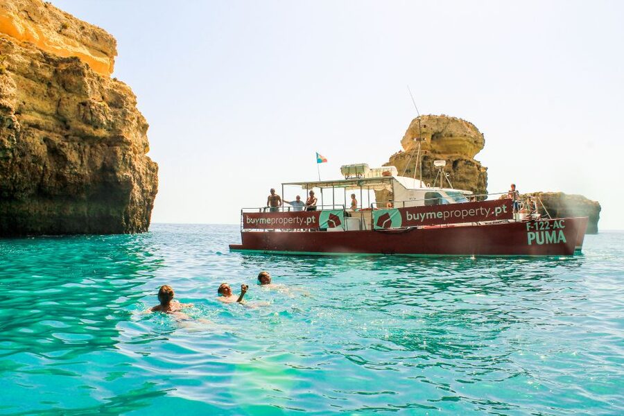 Quarteira: Benagil Cave Guided Catamaran Day Cruise & Drink - Seeing Benagil Cave from the water