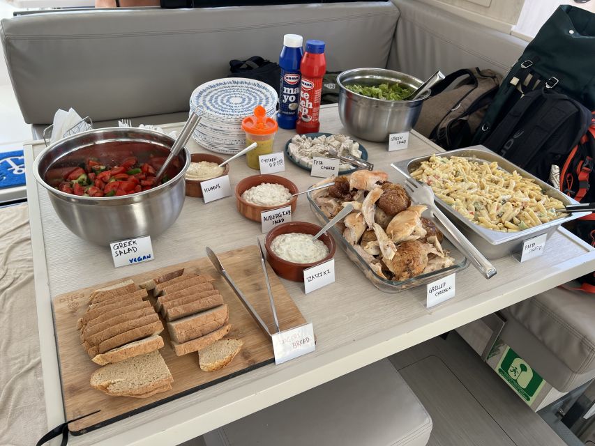 Rhodes: All-Inclusive Catamaran Cruise with Lunch and Drinks - Ladiko Bay: clear water and an easy hour