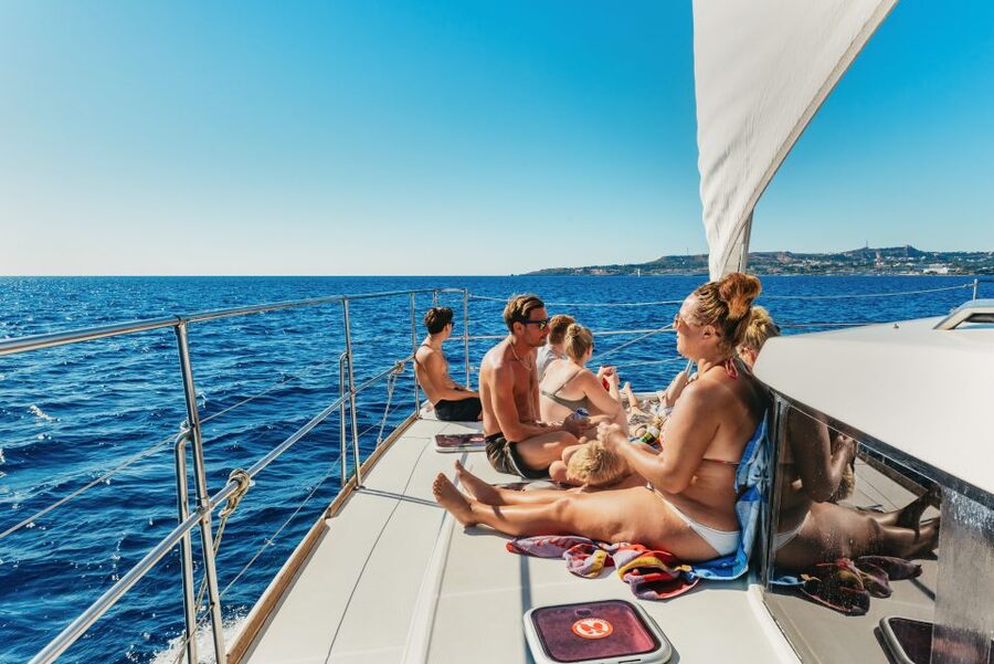 Rhodes: All-Inclusive Catamaran Cruise with Lunch and Drinks - Lunch on deck, with Greek staples