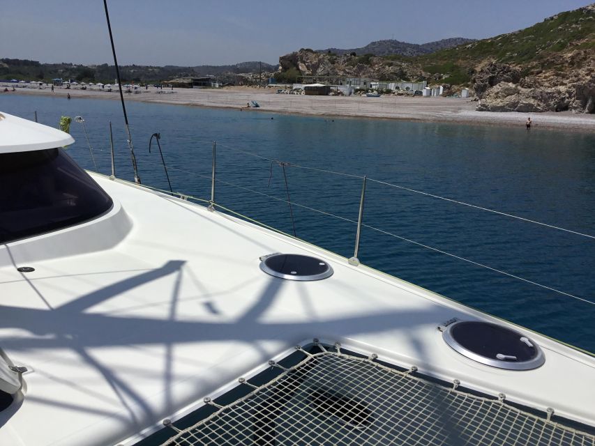 Rhodes: Sailing Catamaran Day Cruise with food and drinks - Afandou combines lunch and another swim