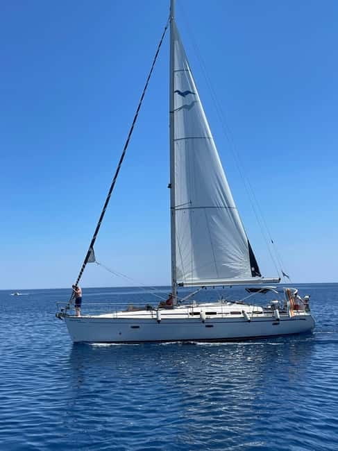 Rhodes: Sunset Catamaran Cruise with Snack, Fruits & Drinks - The return route toward Elli Beach