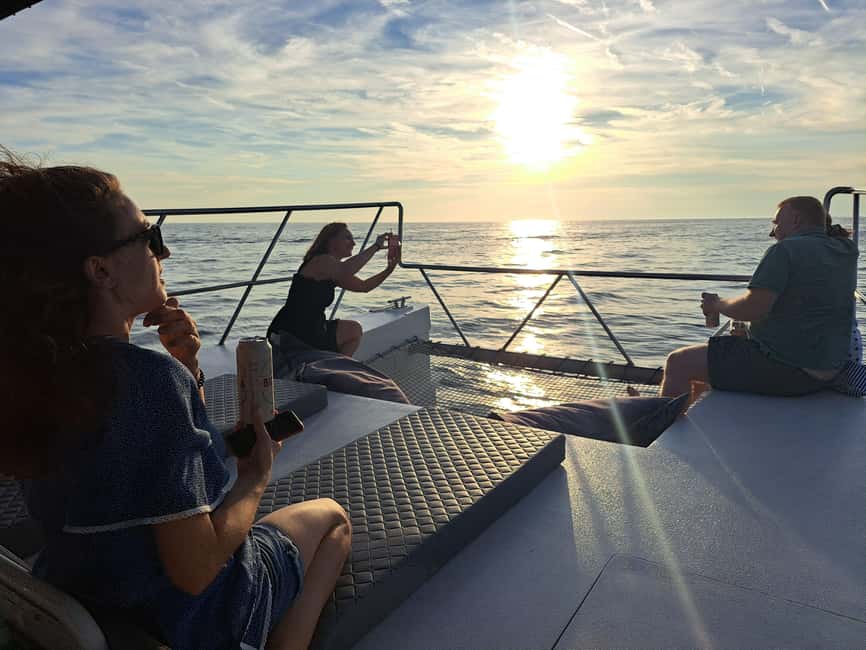 Rovinj: Sunset & dolphin group tours with Catamaran - The first minutes on the water