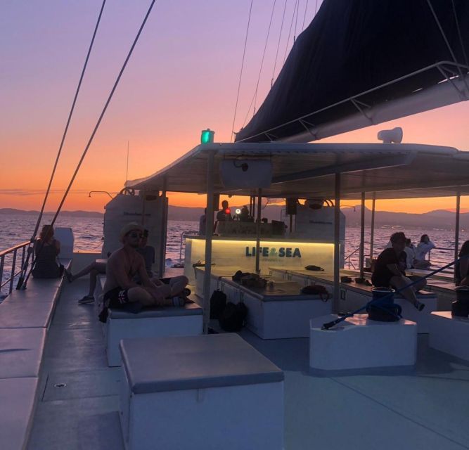S'Arenal: Sunset Catamaran Cruise with BBQ - Timing, languages, and practical details