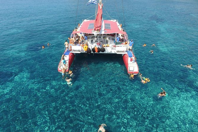 Sailing Catamaran Cruise in Santorini with BBQ, Drinks and Transfer - Red Beach From the Sea