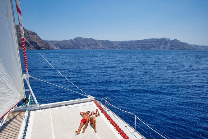 Sailing Catamaran Cruise in Santorini with BBQ, Drinks and Transfer - Who Will Get the Most From This Cruise?