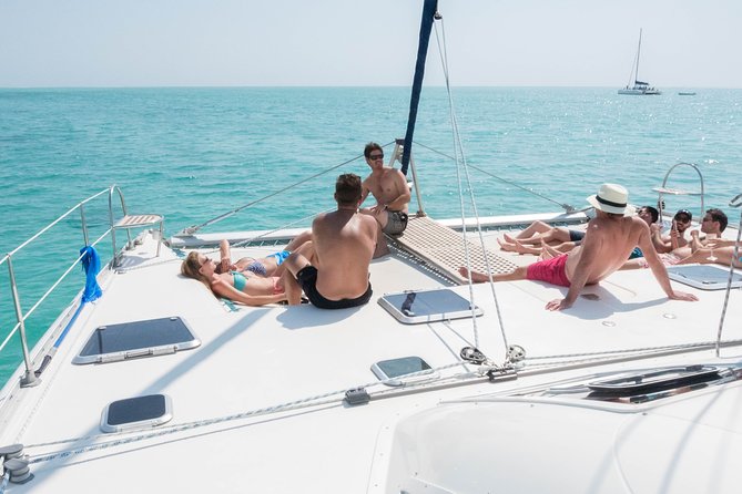 Sailing Catamaran Cruises - Crystal Rock and views toward Le Morne