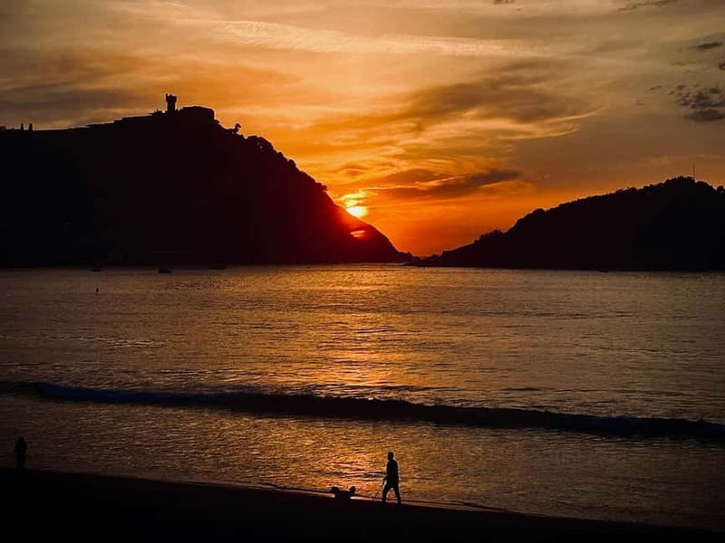 San Sebastián: Sunset Cruise on a Sustainable Catamaran - La Concha Bay at Golden Hour