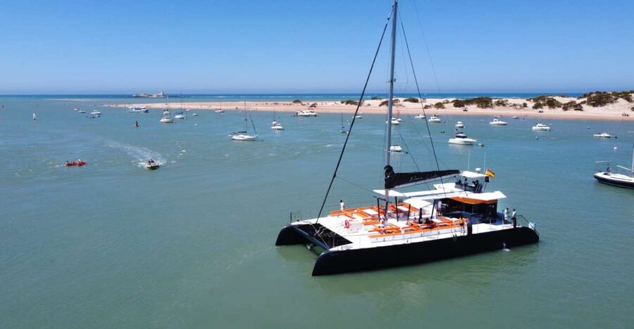 Sancti Petri: Catamaran Cruise with Swim Stop and lunch - Arriving near Sancti Petri Castle
