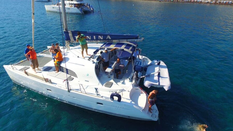 Santorini: 7-Hour Private Catamaran Cruise with Food & Drink - Vlychada Marina begins the southern coast route