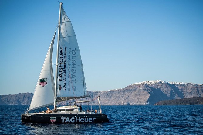 Santorini Adventurous Catamaran Experience with Snorkeling - Sailing past Palea Kameni and Santorini Volcano