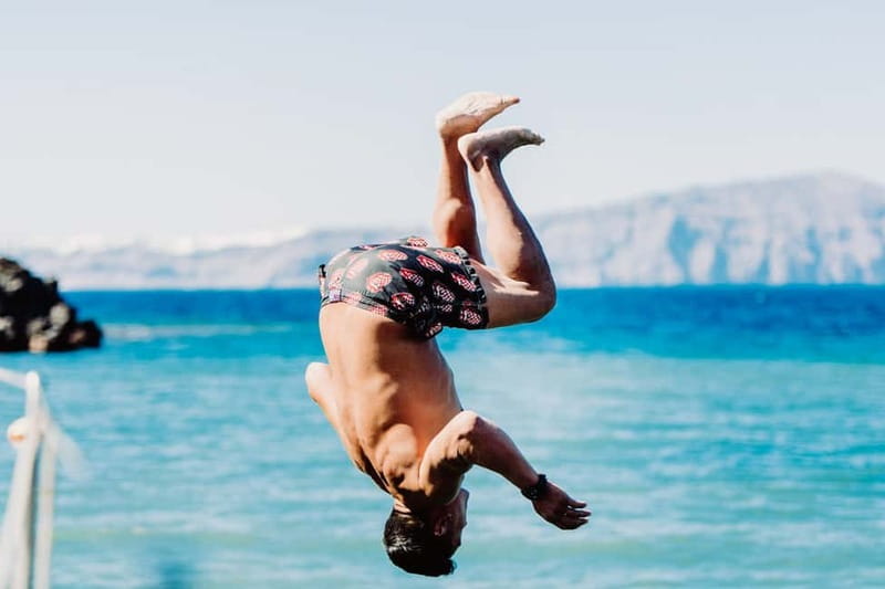 Santorini: Adventurous Catamaran Experience with Snorkeling - Sunset timing and the return to Vlychada