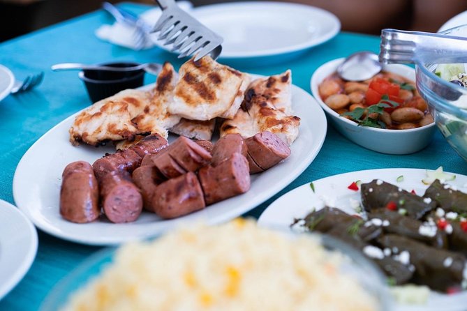 Santorini All-inclusive Catamaran Cruise with Thirassia Stop - Lunch, drinks, and the open bar