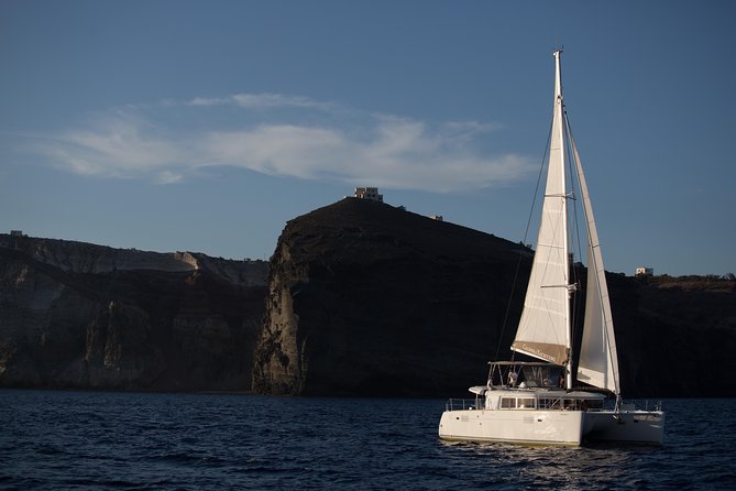 Santorini:All-inclusive Catamaran Cruise with Thirassia Stop - From Fira to Vlichada, the cruise begins on land