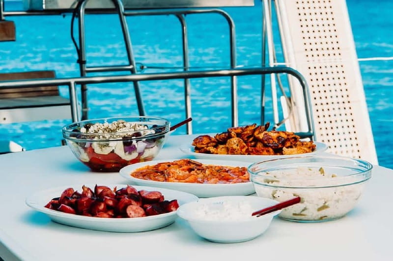 Santorini: All-Inclusive Private Catamaran Experience - Swimming near the hot springs