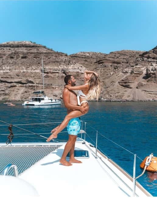 Santorini: All-Inclusive Private Catamaran Experience - Choosing the day cruise or sunset cruise