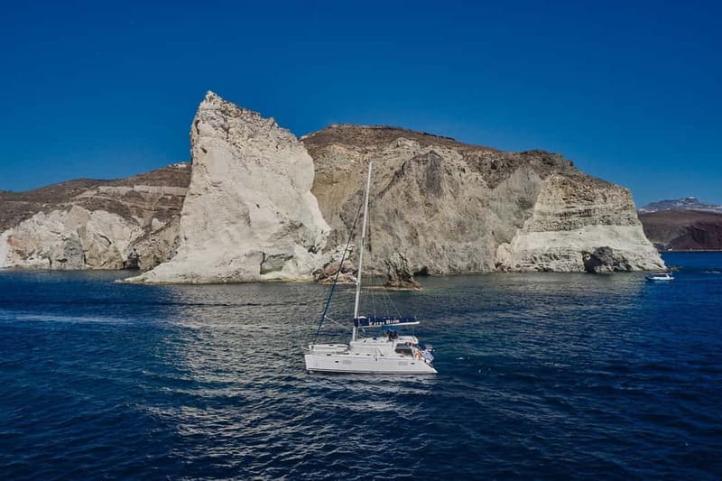 Santorini: Caldera Classic Catamaran Cruise w/ Meal & Drinks - Sunset changes the whole mood