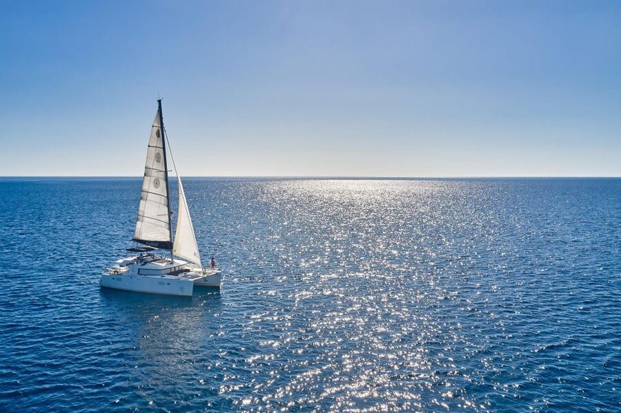 Santorini: Caldera Classic Catamaran Cruise w/ Meal & Drinks - Akrotiri Lighthouse and Indian Face Mountain add context