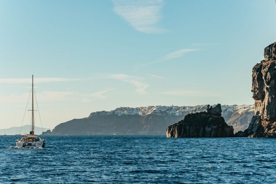 Santorini: Catamaran Caldera Cruise with Meal and Drinks - Pickup, meeting points, and timing