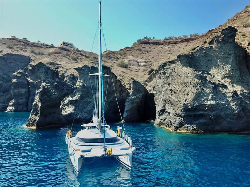 Santorini: Catamaran Cruise with Food and Drinks - Lighthouse, Indian Rocks, and the caldera