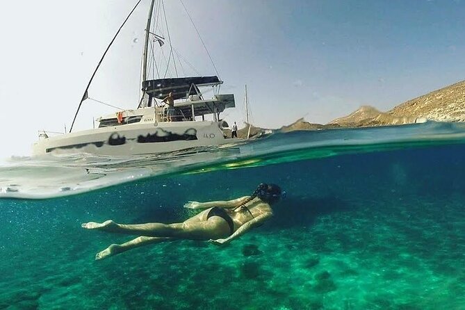 Santorini Catamaran Cruise with Fresh Meal and Open Bar - White Beach and the quieter southern coast