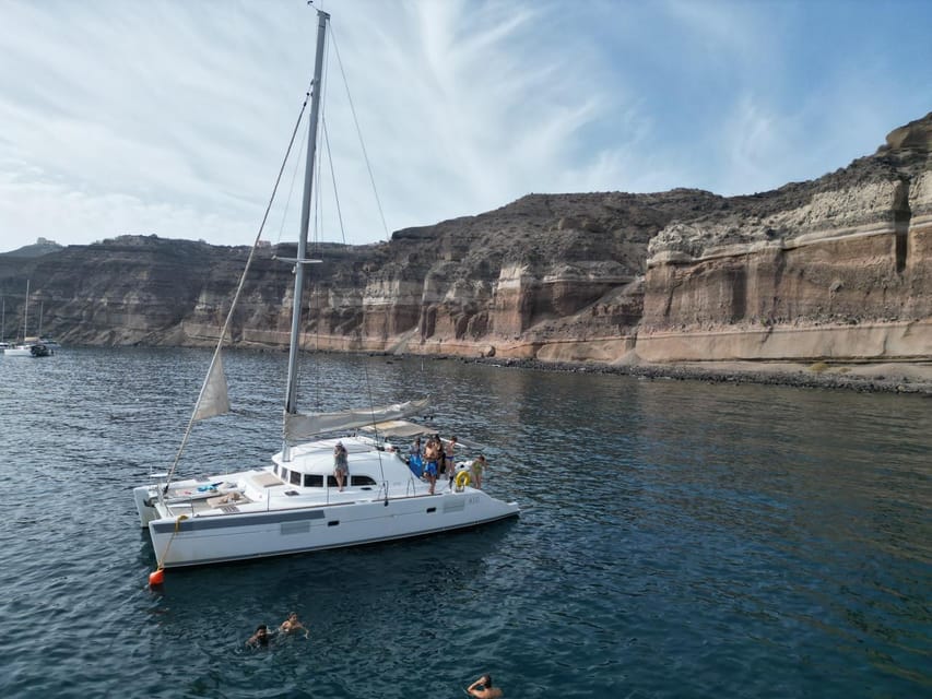 Santorini: Catamaran Cruise with Greek BBQ and Drinks - Boat comfort, music, and the feel of the day