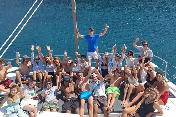 Santorini Catamaran Cruise with Meal and Drinks - Red Beach and Santorini’s Volcanic Coast