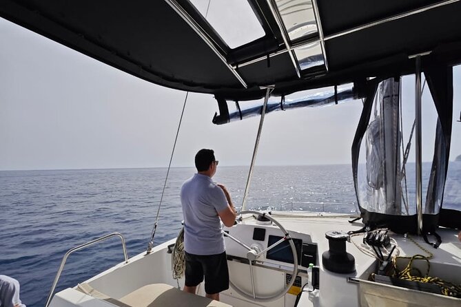 Santorini Catamaran Cruise with Meal and Drinks - Captain Thomas, Ellie, and the Personal Touch