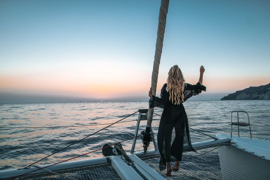 Santorini: Catamaran Cruise with Meal & Open Bar - Red Beach and the southern volcanic coast