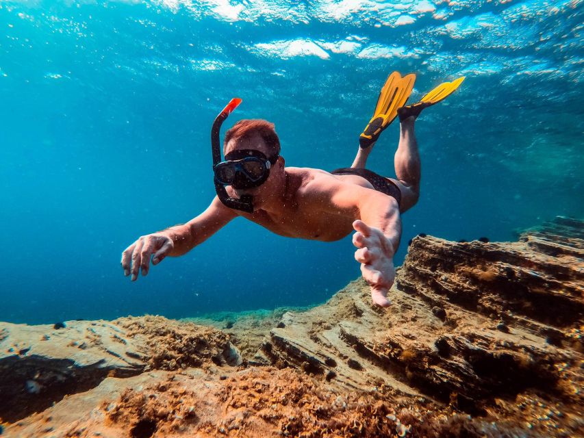 Santorini Catamaran Day Cruise: Lunch, Drinks and Transfers - Booking Details and Simple Preparation Tips