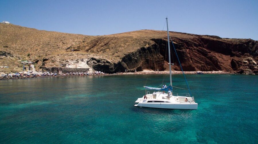 Santorini:Catamaran: private cruise with food & drinks - From hotel pickup to Vlychada Marina