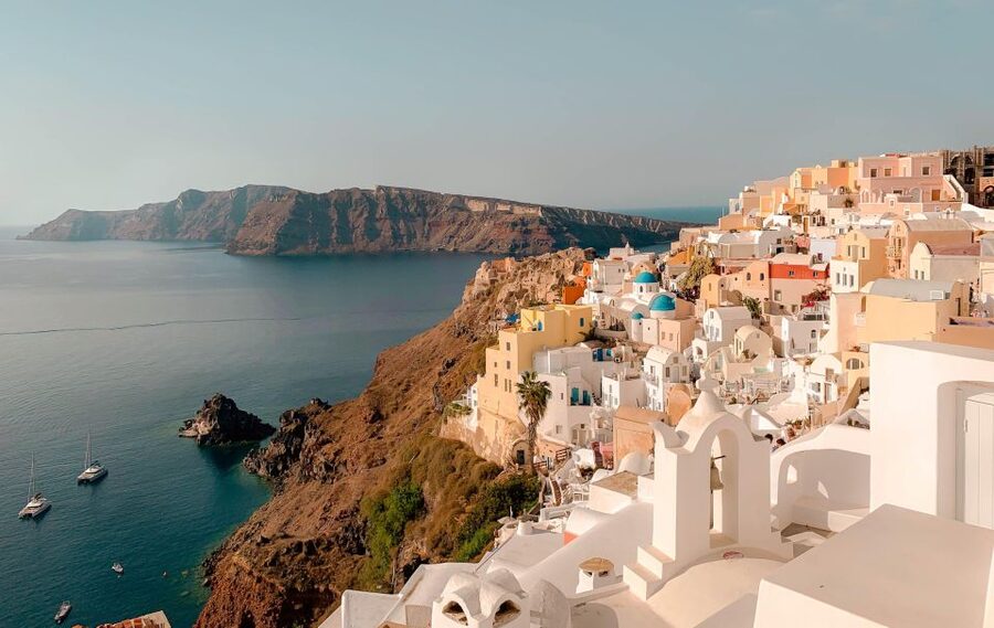Santorini Catamaran Sunset Skyline Cruise - White Beach, Black Cliffs, and Mesa Pigadia