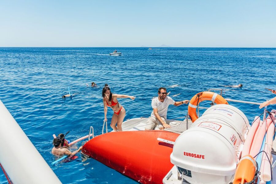 Santorini: Catamaran Tour with BBQ Dinner, Drinks, and Music - Key points to know before booking