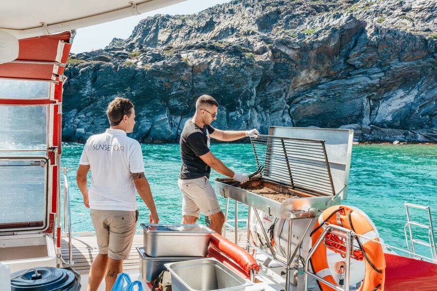 Santorini: Catamaran Tour with BBQ Dinner, Drinks, and Music - White Beach and the best sense of remoteness