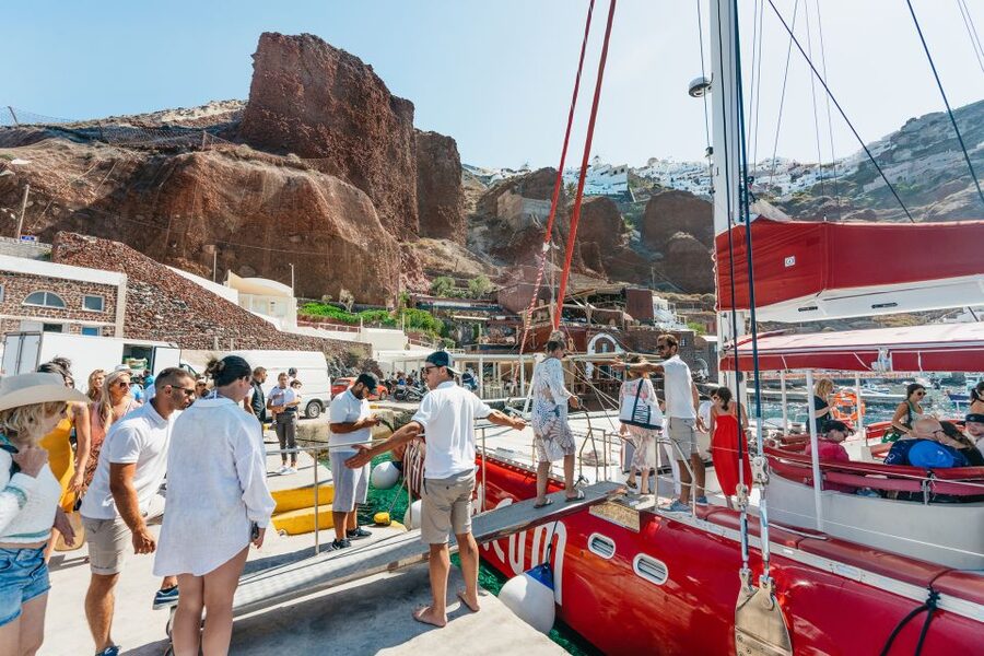 Santorini: Catamaran Tour with BBQ Dinner, Drinks, and Music - Music, dancing, and the right atmosphere